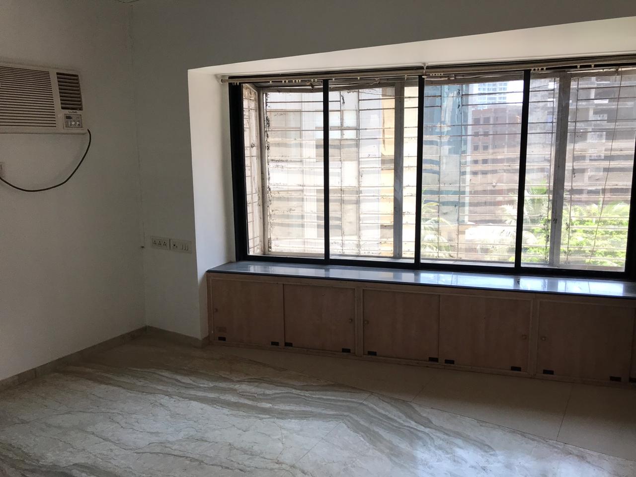 3 BHK Semi Furnished in Dheeraj Gaurav Heights , Andheri West